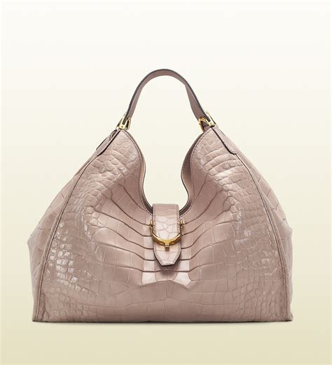 gucci soft stirrup light pink crocodile shoulder bag